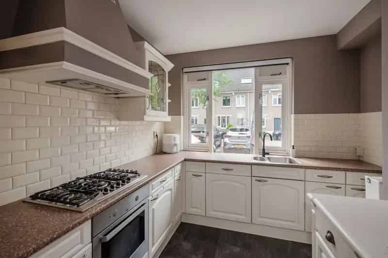 Huis te koop Den Haag Houtwijk 4 kamers tuin 10 zonnepanelen