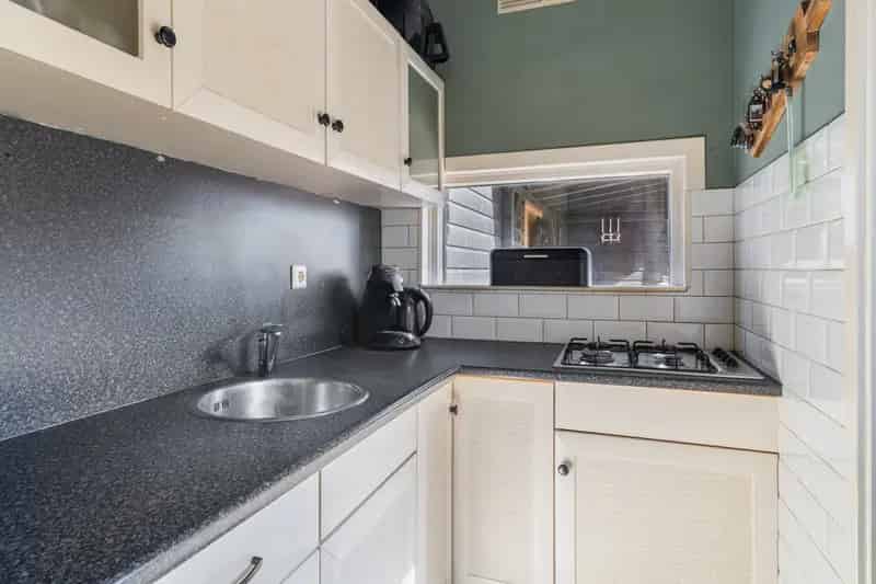 Jaren 30 Hoekwoning Pernis 3 slaapkamers tuin ZuidOosten