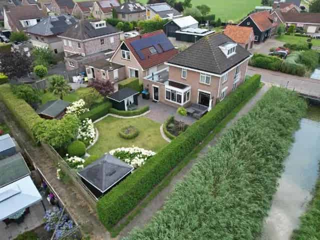 Vrijstaande woning Steenbergen: Ruime garage en perceel van 447m²
