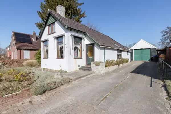 Kluswoning Schildwolde: Vrijstaande woning met schuur garage en grote tuin