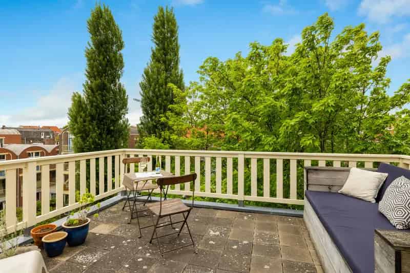 Jordaan Appartement 88m2: 2 slaapkamers, dakterras