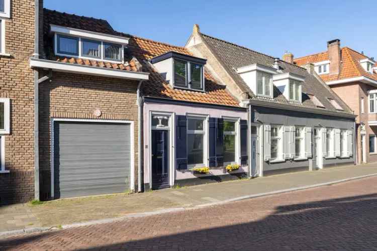 Tussenwoning te koop in Breda t Ginneken