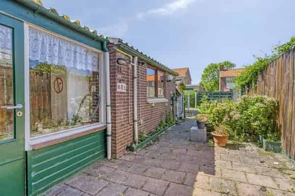 Tussenwoning Oostkapelle 3 slaapkamers diepe tuin nabij strand