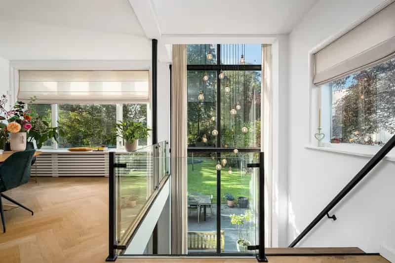 Herenhuis Amsteldijk Noord te koop: 235m², 512m² perceel, privé steiger