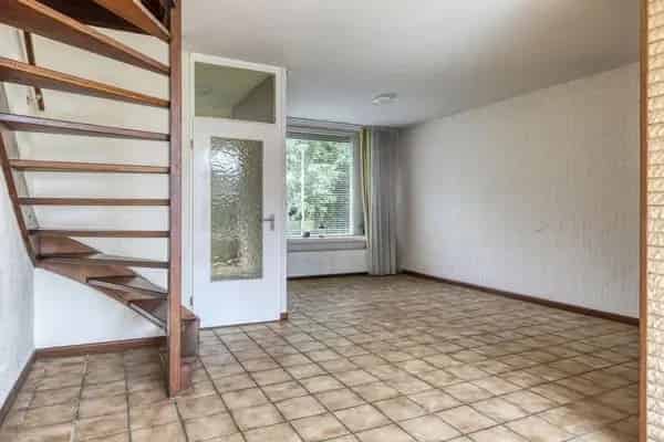 Tussenwoning met 4 slaapkamers en riante tuin