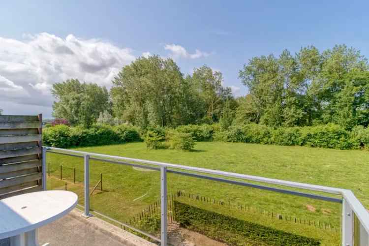 Appartement Nieuwvliet nabij strand met balkon en parkeerplaats