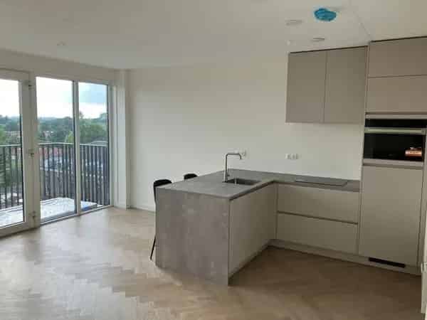 Luxe Bovenappartement De Bij: Wijd Uitzicht en Modern Comfort