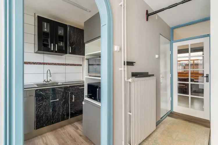 Hoekwoning Pernis 4 kamers Ruime Tuin Houten Berging