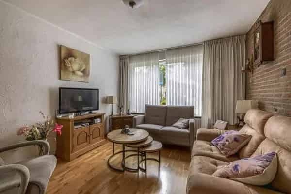2-onder-1-kapwoning met werkplaats garage 3 slaapkamers grote tuin