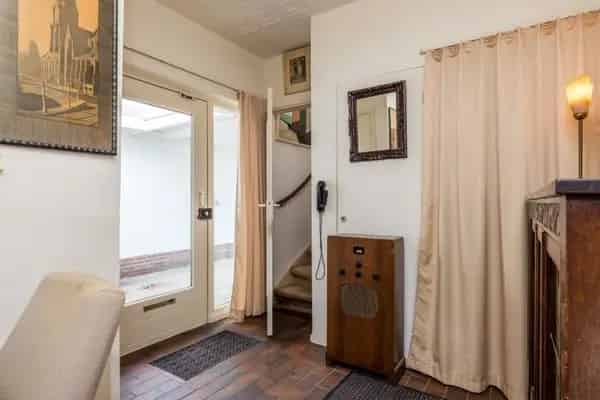 Te renoveren woning Munstergeleen: Tuin, garage & slaapkamer begane grond