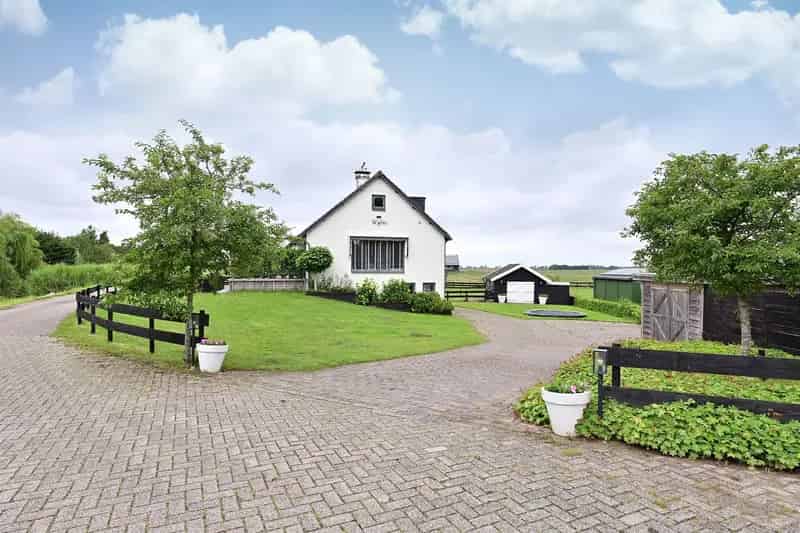 Huis te koop Googweg 22 Muiderberg: Vrijstaande dijkwoning met karakter