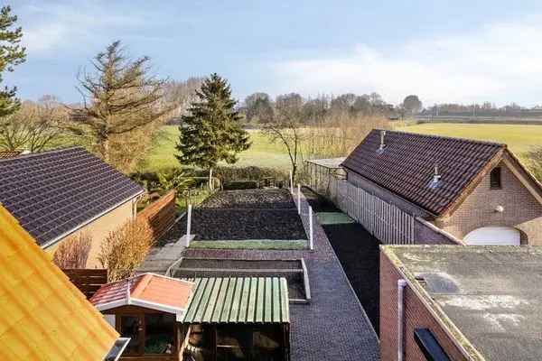 Vrijstaande woning met garage in buitengebied