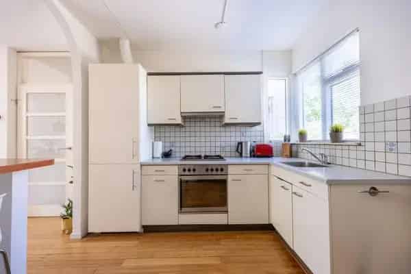Tussenwoning Malden: 3 slaapkamers, moderne badkamer, zonnige tuin