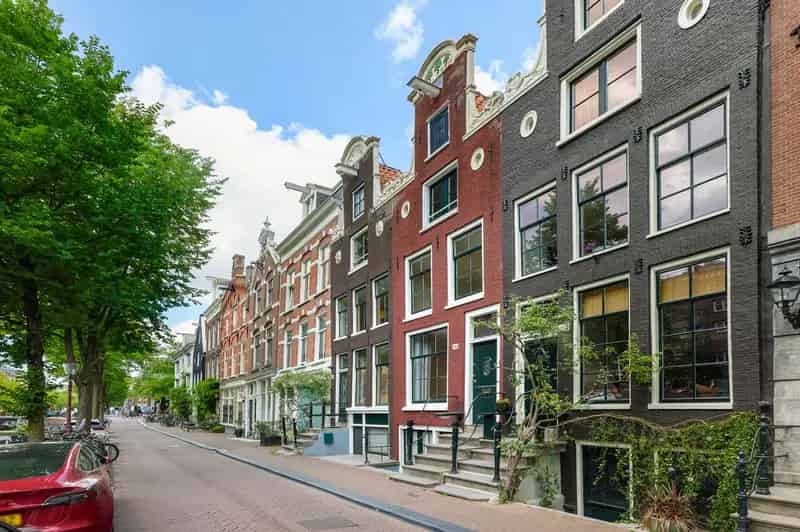 Grachtenpand Amsterdam 146m2 Tuin Dakterras Rijksmonument
