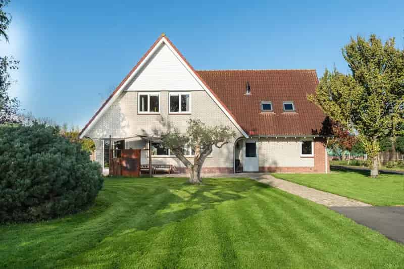 Vrijstaande woning met loods nabij Amsterdamse Bos