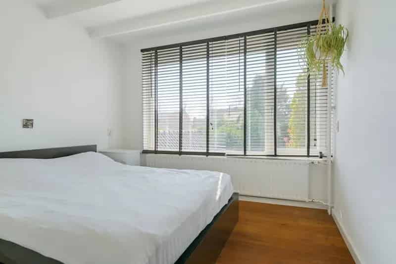 2-onder-1-kapwoning Ulvenhout: Garage Zuidtuin 3 slaapkamers
