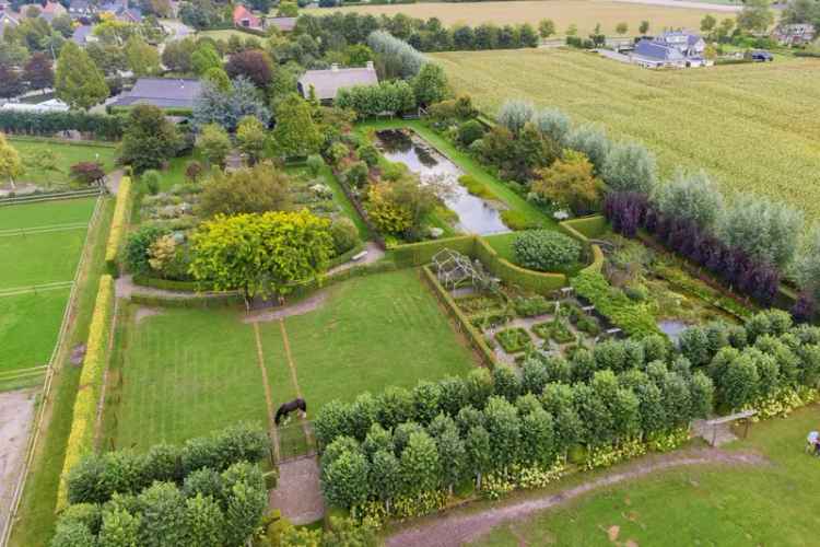 Authentieke Woonboerderij met Bedrijfsruimte en Prachtige Tuin