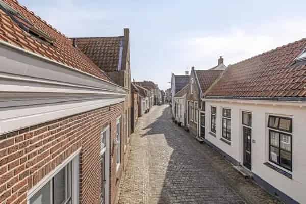 Karakteristieke Tussenwoning Brouwershaven 3 slaapkamers Tuin Garage