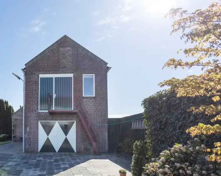 Eindwoning met Bedrijfspand te Tilburg