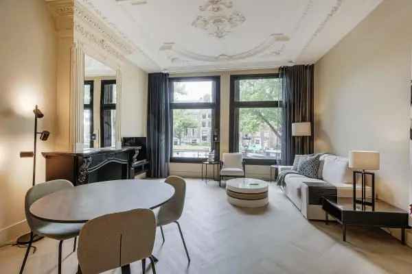 Appartement Amsterdam Grachtengordel: Slaapkamer Balkon Grachtenzicht