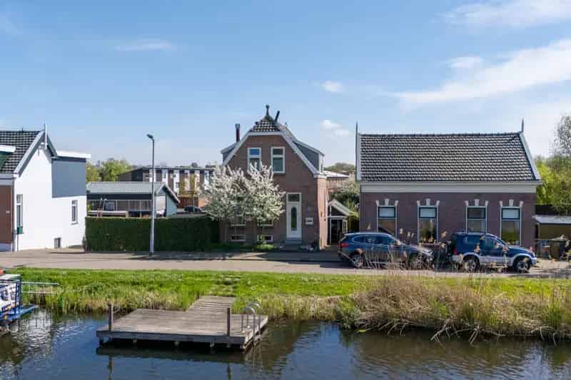 Huis te koop Rotterdam Hillegersberg: gerenoveerd dijkhuis aan de Rotte