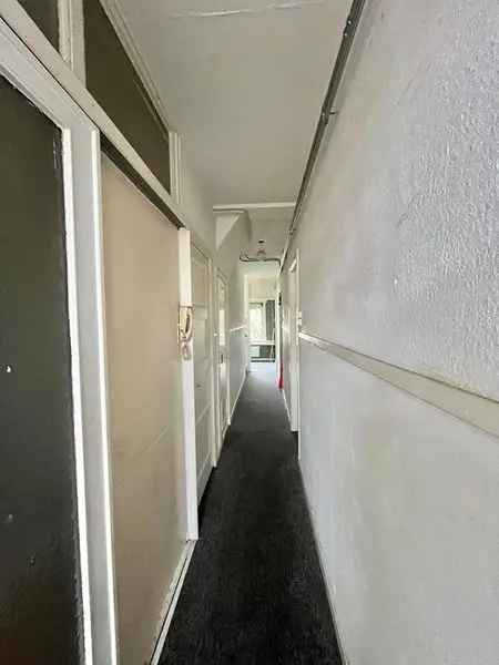 Rotterdam Bloemhof: Ruime bovenwoning 88m2 2 slaapkamers balkon