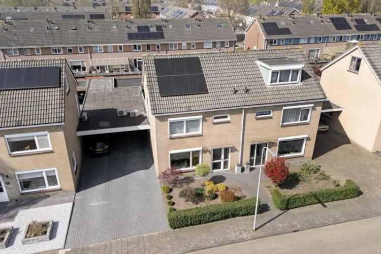 Helft van dubbel woonhuis 4 slaapkamers tuin garage 12 zonnepanelen