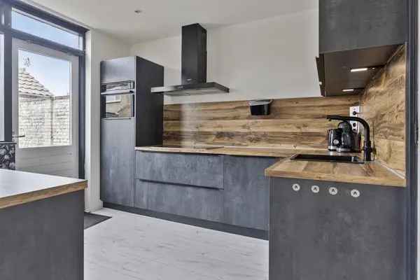 Tussenwoning Terneuzen 3 slaapkamers nieuwe keuken badkamer 8 zonnepanelen