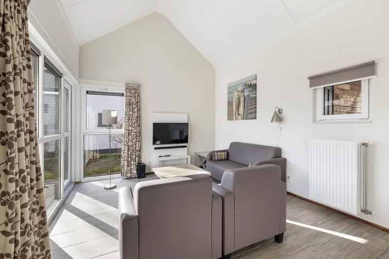 Vakantiehuis Ouddorp: 2 slaapkamers, 2 badkamers, ruim terras
