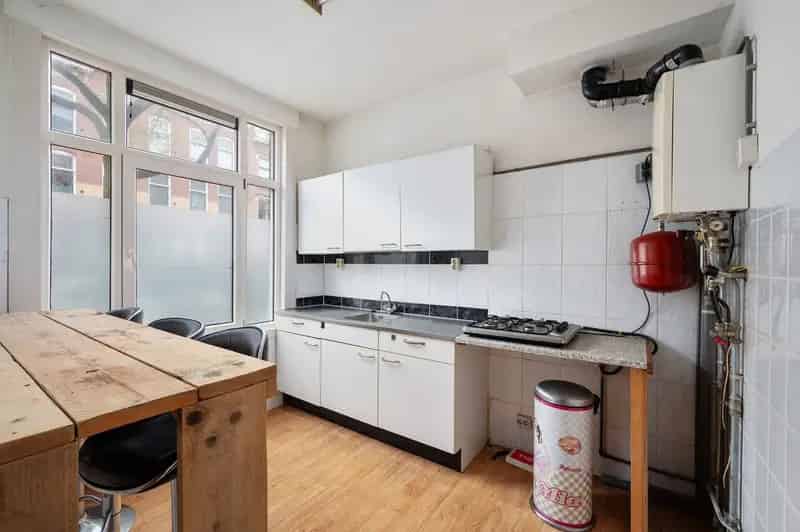 Dubbel Benedenhuis Kralingen 106m2 Diepe Tuin Opknapwoning