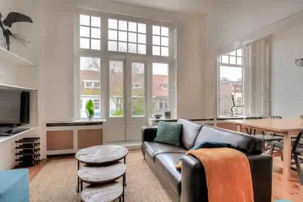 Gemeubileerd 3-kamerappartement met dakterras in herenhuis