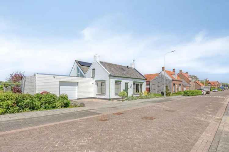 Vrijstaande woning Nieuwvliet met zwembad en gastenverblijf