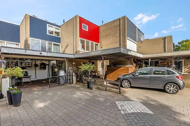 Huis te koop Ede: 3 slaapkamers, moderne keuken badkamer, carport, tuin