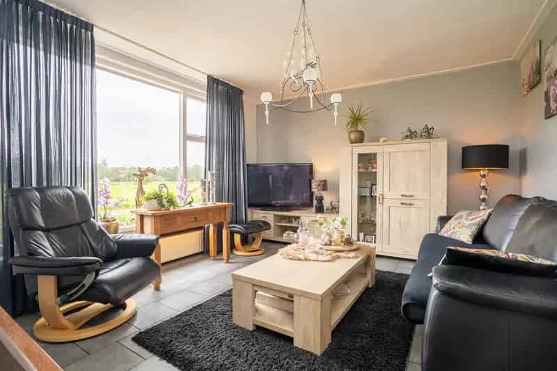 2-onder-1-kapwoning met grote tuin en chalet te koop
