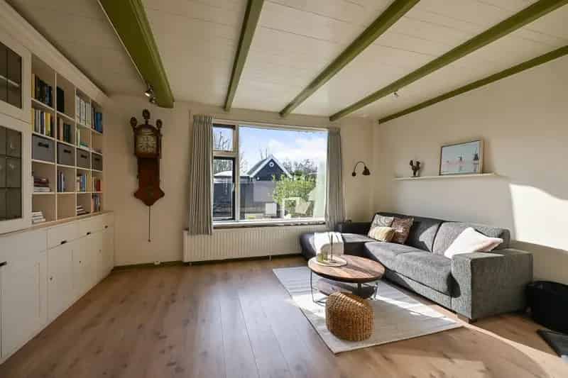 Huis te koop Westzaan: 2-onder-1-kapwoning aan het water