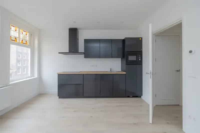 Belegging Jordaan: 3 woningen, 1 leeg, eigen grond
