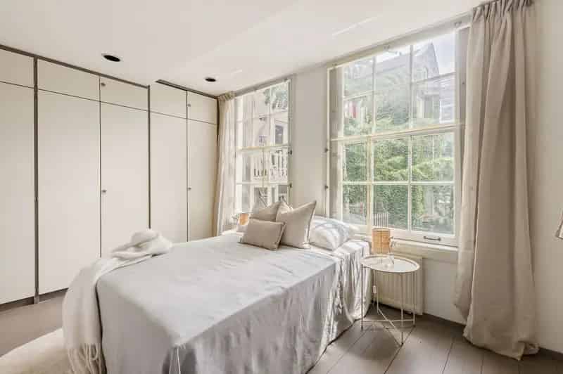 Huis te koop Jordaan 4 slaapkamers 2 badkamers grote tuin Rijksmonument