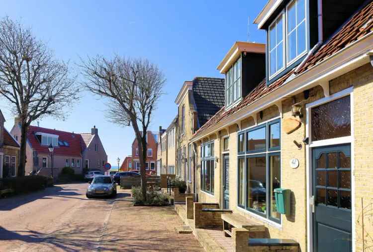 Tussenwoning Oud West nabij haven met bijgebouw