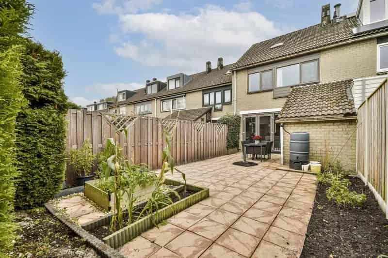 Amsterdam Noord: Een gezinswoning met 4 slaapkamers en zonnige tuin