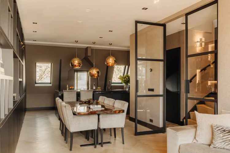 Dubbel Bovenhuis Amsterdam Zuid: Luxe Renovatie Eigen Grond Dakterras