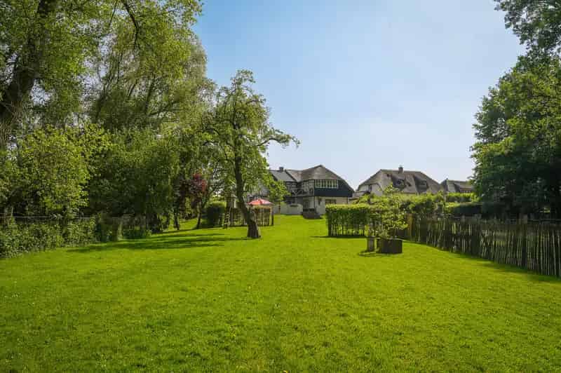 Huis te koop Waaldijk Zuilichem: Dorpssmederij met rivierzicht