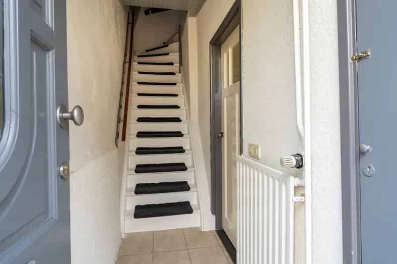 Jaren 30 woning Waalwijk:  Garage, extra woonruimte, opknapper
