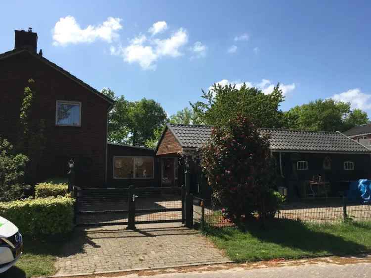 Woning met sanibroyeur