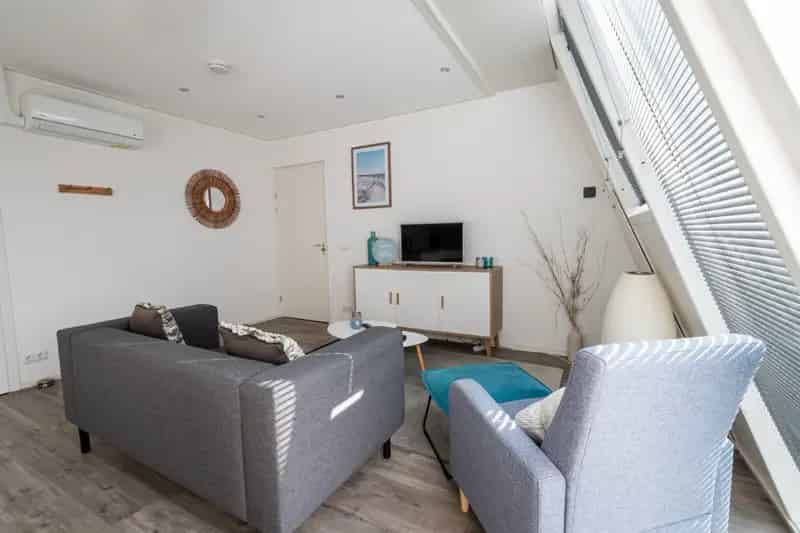 Modern 2-kamer appartement Ameland: Zonnig dakterras & goede verhuur