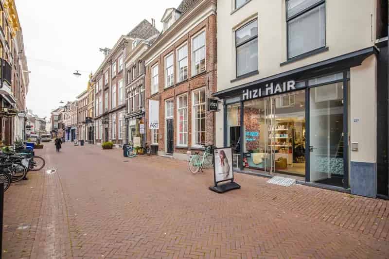 Belegging Arnhem Centrum: Rijksmonumentale Winkel met 2 Verhuurde Bovenwoningen