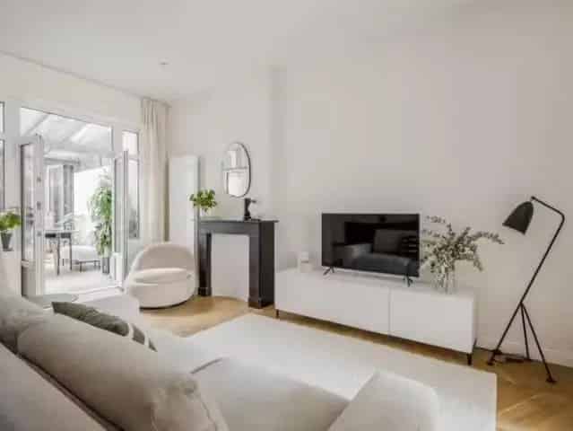 Gerenoveerde woning Amsterdam 61m2 serre tuin