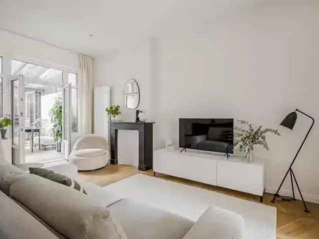 Gerenoveerde woning Amsterdam 61m2 serre tuin