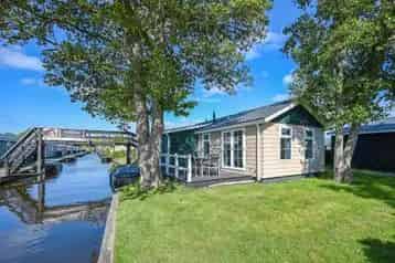 Waterlodge Giethoorn te koop: 6 persoons luxe woning met boot