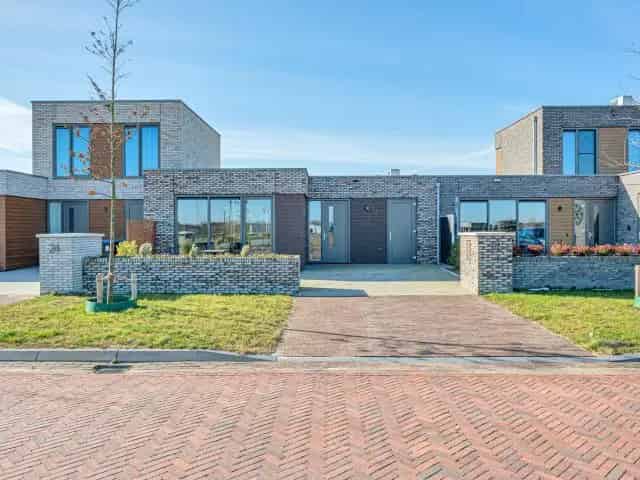 Moderne gelijkvloerse woning Blauwestad - Energielabel A+ - Tuin aan het water