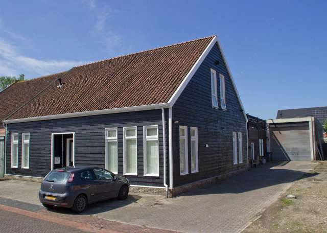 Boerderijwoning Colijnsplaat - 3 Wooneenheden & Royale Loods